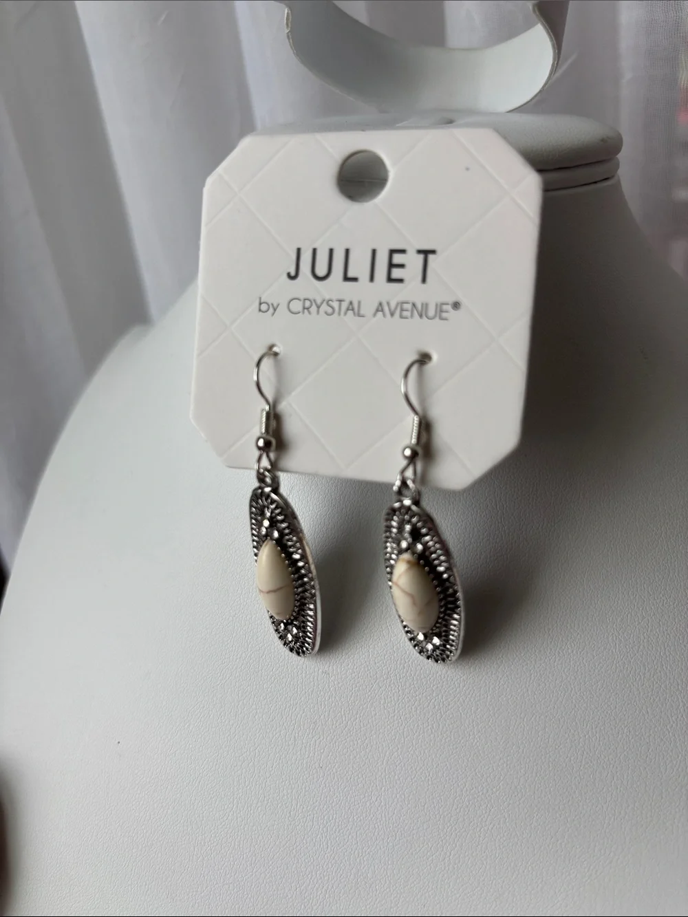 Juliet By Crystal Ave. oval ivory stone set in textured design,dangle,Western